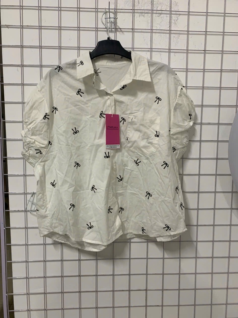 sơ mi trắng nơ đen