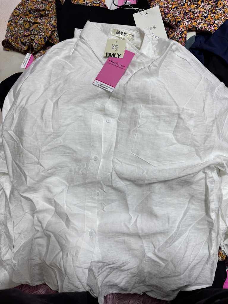 ÁO SƠMI TRẮNG ĐŨI THUY