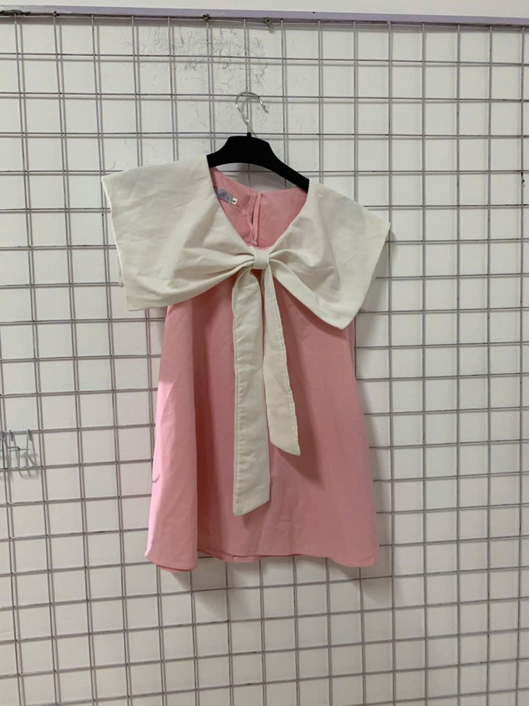 váy hồng vạt nơ trắng 